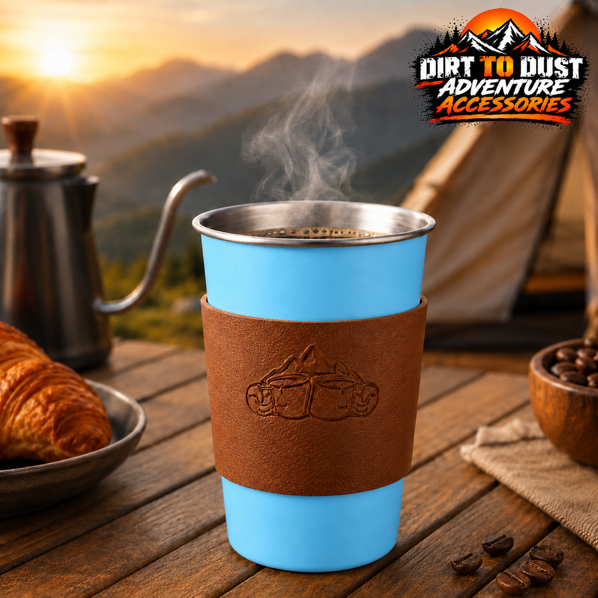 Tall blue 500 ml camping cup with tan removable sleeve on a campsite table.