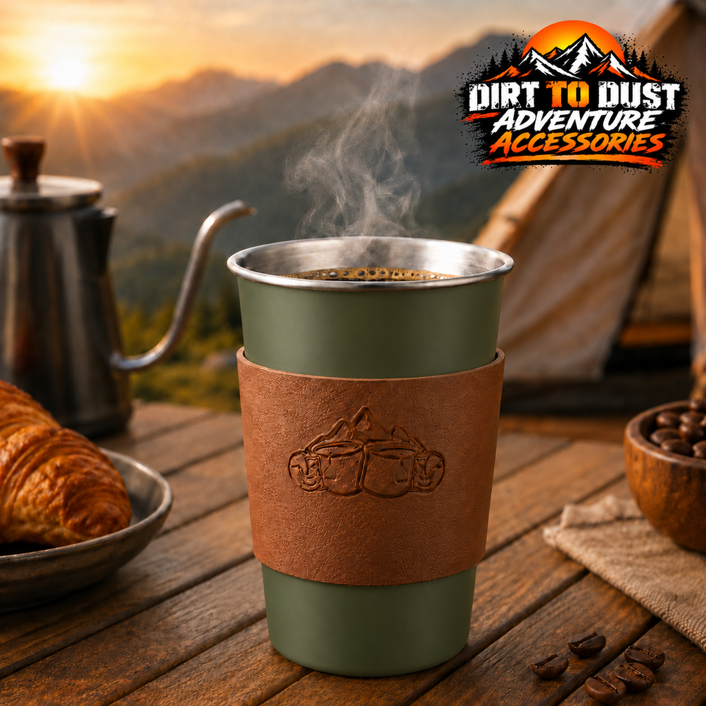 Green 500 ml camping cup with a removable tan sleeve at a campsite, branded Dirt to Dust Adventure Accessories.